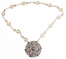 Aranyozott ezüst(Ag) nyaklánc, kövekkel gazdagon kirakott medállal, jelzett, h: 44 cm, bruttó: 47,77...