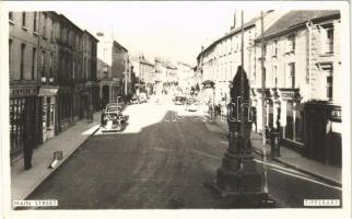 Tipperary, Main Street, shops, automobiles