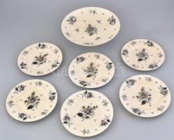 Zsolnay süteményes készlet. Porcelánfajansz. Öblében elefántcsontszín alapmázon virágok, magastüzű, színes mázakkal festve. Hajszálrepedt és apróbb csorbák. Hátoldalán jelzett: mázalatti kékkel festett családi jegy. Zsolnay, Pécs, 1880 körül. Süteményes tányér, d: 22 cm, talpas tál, m:10cm, d:30cm (CSAK SZEMÉLYES ÁTVÉTEL/ONLY PERSONAL COLLECTION)