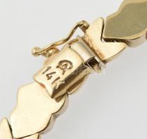 Arany (Au) Nyakék. Biztonsági nyelves zár 1 db biztonsági nyolcassal. h: cca. 42cm. Jelzett, 14k, ne...