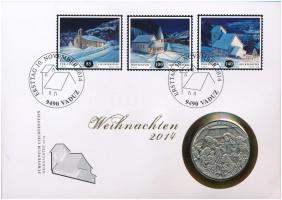 Liechtenstein 2014. Karácsony jelzett Ag emlékérem felbélyegzett borítékban, elsőnapi bélyegzéssel (0.900) T:1 Liechtenstein 2014. Christmas hallmarked Ag commemorative medallion in envelope with stamp and first day cancellation (0.900) C:UNC