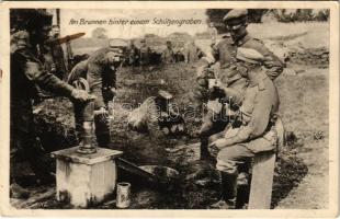 1916 Am Brunnen hinter einem Schützengraben / WWI German military, soldiers at the well behind the trenches (EK)