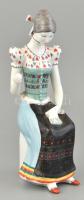 Hollóházi hímző asszonyt ábrázoló kézzel festett porcelán figura, apró kopásokkal. m:24 cm