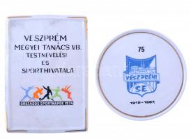 1974. Veszprém Megyei Tanács VB. Testnevelési és Sporthivatala festett, jelzett hollóházi porcelán plakett (113x80mm) + 1987. Veszprém SE 1912-1987 festett, jelzett hollóházi porcelán plakett tokban (89mm)