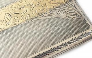 Ezüst (Ag) Cigarettatárca. Jelzett: agárfejes fémjellel, mesterjegy: JS. Vésett neorokokó mintával, ...