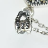 Ezüst(Ag) markazittal díszített ékszerszett (nyaklánc, fülbevaló, medál, gyűrű), jelzett, bruttó: 18...