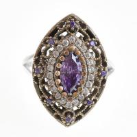 Aranyozott ezüst(Ag) gyűrű, lila kövekkel, jelzett, kis deformációval, méret: 59, bruttó: 9,15 g