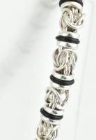 Ezüst (Ag) Férfi nyaklánc és karkötő kaucsukkal. Jelzett. Jó állapotú. bruttó: 255 g, h: 25 és 59 cm