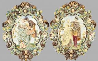 Német ovális, fali dísztányér pár, fajansz, öblében relief, színesen festett jelenet, enyelgés, udvarlási jelenet. Sérült, restaurált. Jelzett. 44x35 cm