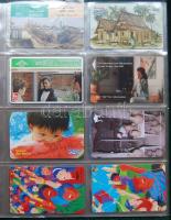 148 darabos külföldi telefonkártya-gyűjtemémy új gyűrüs berakóban