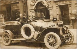 Vintage car with driver, automobile. photo (EK)