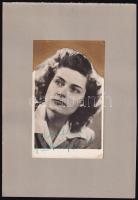 cca 1940 Karády Katalin (1910-1990) színésznő saját kezű aláírt fotólapja korabeli rajongói kompozícióban, feje körül eredeti aranyporos papírral, mint glóriával, kartonra ragasztva