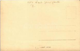 Budapest X. Kőbánya, MÁV északi járműjavító belső, szerelőmunkások a csarnokban vonat előtt. photo