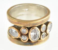 Aranyozott ezüst(Ag) fehér kövekkel kirakott gyűrű, jelzett, méret: 52, bruttó: 6,6 g