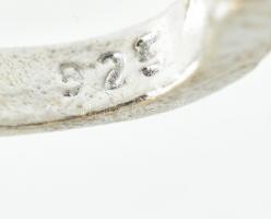 Ezüst(Ag) ékszerszett: csavart nyaklánc medállal, gyűrű, fülbevalópár, jelzett, bruttó: 11,96 g