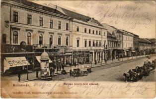 1905 Kolozsvár, Cluj; Mátyás király tér, Schuster Emil üzlete, drogéria, Kónya Sándor, Hanitz Sándor könyvkötészete, Mezőgazdasági Bank. Schuster Emil kiadása / square, shops, drogerie, bank (fa)