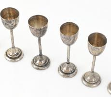 9 db ezüst (Ag) talpas kupica, jelzett, kopottas állapotban, m: 11 cm, 304 g