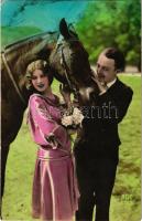 1931 Romantic couple with horse (EK)