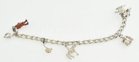 Ezüst(Ag) masszív pancer karkötő, 5 db függővel, apró javításokkal, jelzett, bruttó: 22,3 g