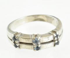 Ezüst(Ag) gyűrű apró kék kövekkel, jelzett, méret: 49, bruttó: 2,9 g