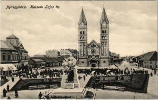 Nyíregyháza, Kossuth Lajos tér és szobor, piac, üzletek, templom. Szántó Ernő kiadása