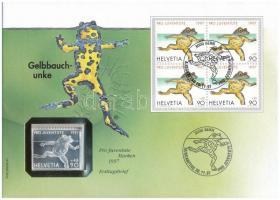 Svájc 1997. "Pro Juventute 1997 90+45" jelzett Ag bélyegérem, "Sárgahasú unka" érmés borítékban, bélyeggel, bélyegzéssel (0.999) T:1 patina Switzerland 1997. "Pro Juventute 1997 90+45" hallmarked Ag commemorative medallion, in "Yellow-bellied toad" envelope with stamp and cancellation (0.999) C:UNC patina