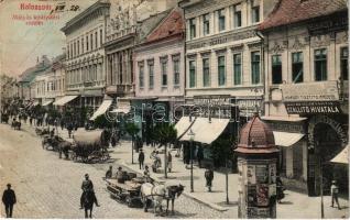 1908 Kolozsvár, Cluj; Mátyás király tér, Stiff és társa papíros áruház, Iparbank Rt., Püspöky Miklós harisnyakötödéje, Feichtinger J. vegyészeti tisztító, Mozgófénykép színház, Magyar királyi államvasútak szállító intézete, Reisinger József mérnök üzlete / square, cinema, shops, bank