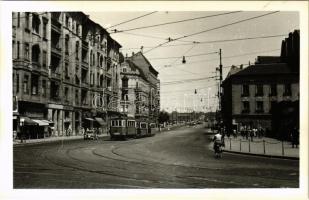 Budapest II. Margit körút, villamos, papír és írószer, Patyolat, fűszer és csemege üzlet, dauer fodrászat. photo