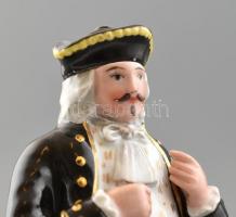 Egy barokk ruhába öltözött úr, porcelán.
Alján Dionys Pozsonyi Borozó etikettel.
1860 körül. m: 14...