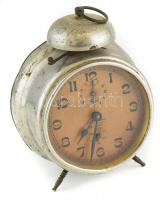 Breuer Lipót órás és ékszerész Gyoma reklám feliratos, régi mechanikus vekker óra. Korának megfelelő állapotban, kisebb kopásnyomokkal, rozsdafoltokkal, működik, d: 10,5 cm