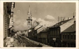 1940 Beszterce, Bistritz, Bistrita; utca, templom, Piele, F. Pardy, Kerekes és Czitron üzlete, Transsylvania biztosítás / street, shops, insurance company, church. Foto Römischer (EK)