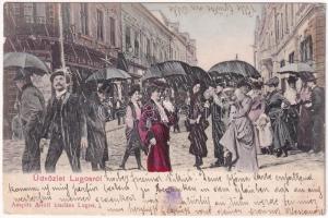 1904 Lugos, Lugoj; Deák Ferenc utca, Epstein Sándor üzlete. Montázs esernyős urakkal és hölgyekkel esőben / street view, shops. Montage with ladies and gentlemen holding umbrellas in the rain (EB)