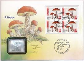 Svájc 1994. Bélyegérem, jelzett Ag, felbélyegzett Rotkappe borítékban, bélyegzéssel (0.999) T:1 patina Switzerland 1994. Stamp shaped commemorative Ag medallion in Rotkappe envelope with cancellation (0.999) C:UNC patina