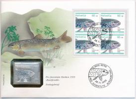 Svájc 1995. Sebes Pisztráng jelzett Ag bélyegérem, érmés borítékban, bélyeggel és bélyegzéssel (0.999) T:1 hátoldalon patina  Switzerland 1995. Bachforelle hallmarked Ag stamp-shaped commemorative medallion in coin envelope with stamp and cancellation (0.999) C:UNC patina on reverse