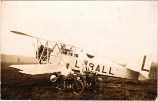 1927 Kassa, Kosice; Klein Teri (Graf Endre zenetanár tanítványa) L-BALL lajstromjelű cseh repülőgép mellett motorkerékpáron / Hungarian lady on motorbike next to a Czech aircraft. photo