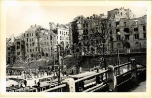 Budapest II. Széll Kálmán tér a második világháborúban lebombázott épületekkel, villamosok. photo
