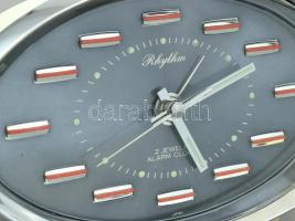 Vintage japán Rhythm márkájú ébresztőóra, mechanikus szerkezet, műanyag ház, analóg kijelzős. Működi...