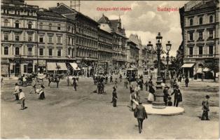 1909 Budapest VI. Oktogon téri részlet, Ernyei Lajos, Kömlődi Jakab üzlete, villamos. Divald Károly műintézete 239-1908. (EK)