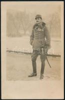 cca 1920 Katonatiszt kitüntetésekkel, karddal, fotólap, 14×9 cm