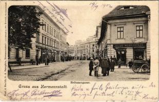 1902 Nagyszeben, Hermannstadt, Sibiu; Heltauergasse / Disznódi utca, Julius Wermescher, Carl Landmann üzlete, Transsylvania szálloda. G. A. Seraphin kiadása / street view, shops, hotel + "NAGY-SZEBEN - KIS-KAPUS 149. SZ." vasúti mozgóposta bélyegző (EB)