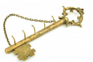 Kulcs formájú, réz kulcstartó, felakasztható. Jó állapotban. h.: 27 cm. m.: 9 cm.