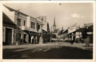 1941 Dés, Dej; Bánffy utca, üzletek. Jónás Elemér kiadása / street view, shops (EB)