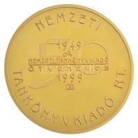 1999. "50 éves A Nemzeti Tankönyvkiadó" aranyozott Br emlékérem, dísztokban (60mm) T:2 (PP...