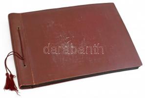 cca 1930-1970 Családi fotóalbum, benne kb. 75 db fotóval, vegyes méretben, kissé sérült, kopott zsin...