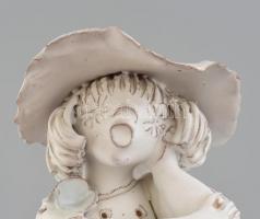 Kovács Éva (1938-2017): Ülő lány, mázas kerámia, kopásnyomokkal, jelzett, m: 17 cm