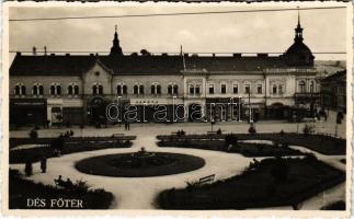 1943 Dés, Dej; Fő tér, Bíró, Wolf, Szígyártó Sámuel, Meritz Ernő, Szentkirályi Jenő, Salamon Jakab üzlete, gyógyszertár / main square, shops, pharmacy