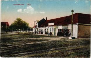 Dombóvár, Újdombóvár; Fő tér, Burger Adolf üzlete. Vasúti levelezőlapárusítás 195. (EM)