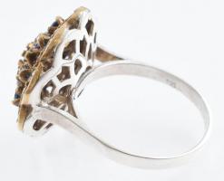 Ezüst(Ag) gyűrű kék-fehér kövekkel gazdagon kirakva, jelzett, méret: 58, bruttó: 5,3 g