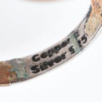 Ezüst(Ag) masszív gyűrű kövekkel gazdagon kirakva, jelzett, méret: 58, bruttó: 8,6 g