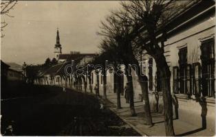 Vágújhely, Waag-Neustadt, Nové Mesto nad Váhom; Stefánikova cesta / Stefánik utca, templom, üzlet. Ján Trnovsky kiadása / street view, church, shop (fa)